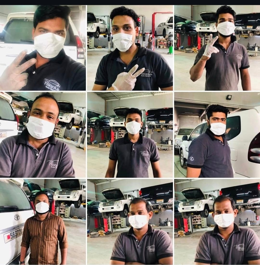 Grid of nine Nagoya Garage technicians in branded workshop polos